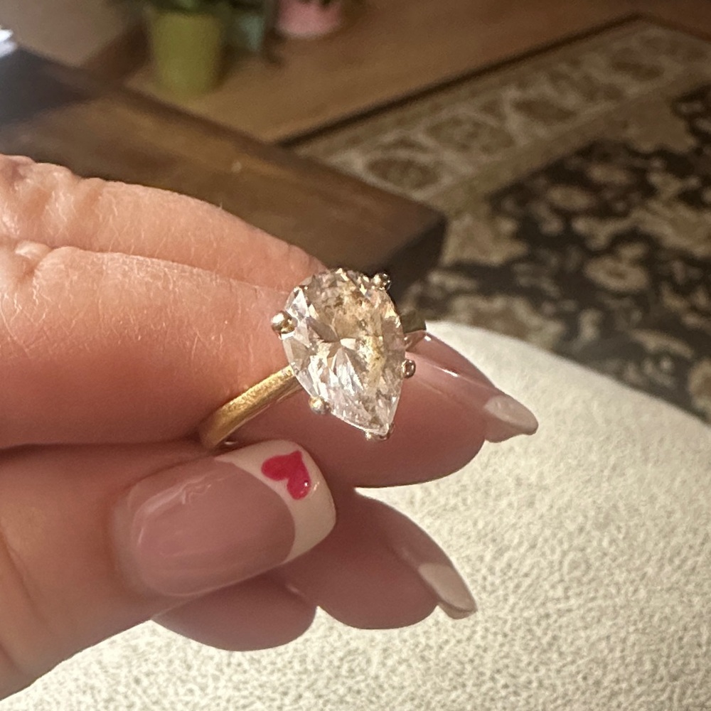 Elegant Gold and Silver Heart-Shaped Ring
